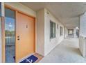 Condominium entrance with a welcome mat and an ocean view at 4650 Bay Blvd # 1012, Port Richey, FL 34668