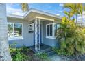 Charming front porch featuring a decorative support, a mailbox and elegant door at 6618 3Rd N Ave, St Petersburg, FL 33710