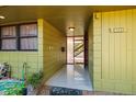 Open entryway with view of staircase, light terrazzo floor, and access to outside area at 724 69Th S Ave, St Petersburg, FL 33705