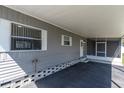 View of a spacious covered carport with ample parking and easy access to the home's entrance at 9790 66Th N St # 469, Pinellas Park, FL 33782