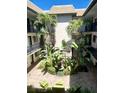 Courtyard view with seating arrangements and palm trees at 125 5Th Ne Ave # 240, St Petersburg, FL 33701
