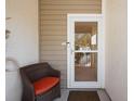 Cozy front entry with chair provides a welcoming first impression at 11320 Harbor Way # 1725, Largo, FL 33774