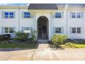 Two-story condo building with a welcoming entrance at 387 S Mcmullen Booth Rd # 16, Clearwater, FL 33759