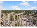 Open air balcony featuring gorgeous views of lush greenery and the city at 628 Cleveland St # 1507, Clearwater, FL 33755
