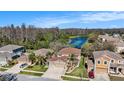 Desirable suburban home near a picturesque lake and lush green trees and cul-de-sac in a lovely neighborhood at 5843 Justicia Loop, Land O Lakes, FL 34639