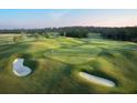 Scenic golf course view with sand traps and lush green fairways at 5047 Summit View Dr, Brooksville, FL 34601