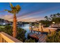 Scenic waterfront view from the property, showcasing the boat dock and surrounding canal at 6606 Dolphin Cove Dr, Apollo Beach, FL 33572