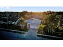 An aerial view of the home, showcasing its landscaped surroundings and neighborhood at 4823 Deer Lodge Rd, New Port Richey, FL 34655