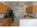Functional kitchen featuring stainless steel appliances and ample cabinet space at 829 Lantern Way # 829, Clearwater, FL 33765