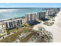 Panoramic aerial view showcases oceanfront high-rise condos, beach, and scenic waterfront, highlighting premier location at 1270 Gulf Blvd # 905, Clearwater Beach, FL 33767