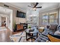 Inviting living area with television, adjacent breakfast bar, and lots of natural light at 1810 E Palm Ave # 4304, Tampa, FL 33605
