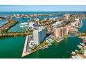 Expansive waterfront community with city views, boat docks, and stunning vistas at 31 Island Way # 106, Clearwater Beach, FL 33767