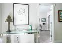 Tastefully decorated foyer featuring a console table with stylish decor, creating an inviting atmosphere at 923 Arlington N Ave, St Petersburg, FL 33705
