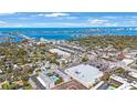 Aerial view of the condominium, showcasing its location near the bay, city, and local amenities at 215 Valencia Blvd # 205, Belleair Bluffs, FL 33770