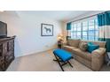 Cozy living room with comfortable seating and natural light at 2749 Countryside Blvd # 28, Clearwater, FL 33761