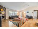 Bright and airy living room with vaulted ceilings, stylish furnishings, and a contemporary fireplace at 217 2Nd Sw St, Largo, FL 33770
