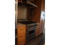 Gourmet kitchen with stainless steel appliances, including a stove and a microwave at 1208 E Kennedy Blvd # 1022, Tampa, FL 33602