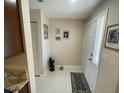 Bright foyer features tile flooring and door to the living area at 1601 43Rd N St # 226, St Petersburg, FL 33713