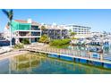 Waterfront condo with boat dock access; convenient beach access via elevated wood walkway at 19937 Gulf Blvd # B-3, Indian Shores, FL 33785
