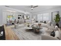 Open-concept living room flowing into a dining area and modern kitchen at 311 W Fern St, Tampa, FL 33604