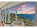 Enjoy breathtaking sunsets from your private balcony overlooking the serene waterfront at 6001 Bahia Del Mar Cir # 429, St Petersburg, FL 33715