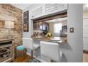 Breakfast bar featuring granite countertops and seating overlooking the kitchen at 6800 20Th N Ave # 309, St Petersburg, FL 33710
