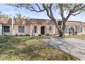 Inviting home exterior with a meticulously landscaped yard and mature shade trees at 9845 84Th Way, Seminole, FL 33777