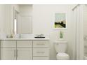 Bright bathroom with white vanity, marble countertop, and modern fixtures at 12438 Sweet Angel Aura Way, Parrish, FL 34219