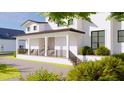 Charming two-story white home with a covered front porch and well-maintained landscaping at 4809 W Juno St, Tampa, FL 33629