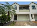 Charming exterior view of a well maintained home with beautiful greenery at 538 Walden Ct, Dunedin, FL 34698