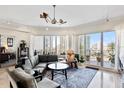 Bright living room featuring city views, hardwood floors, comfortable seating, and modern decor at 449 S 12Th St # 1705, Tampa, FL 33602