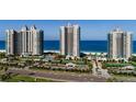 Luxury condo buildings with tropical landscaping, pools, and tennis courts near the beach at 1520 Gulf Blvd # Ph2, Clearwater Beach, FL 33767