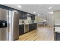 Modern kitchen featuring stainless steel appliances and sleek, dark cabinetry at 1941 48Th S St, St Petersburg, FL 33711