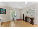 Bright foyer featuring hardwood floors, natural light, and decorative console table at 419 Richards Ave, Clearwater, FL 33755
