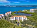 Stunning aerial view showcasing the building's prime location near the water at 4801 Osprey S Dr # 404, St Petersburg, FL 33711