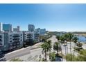 Scenic view overlooking a city with tropical palms, highways, and waterways at 201 W Laurel St # 811, Tampa, FL 33602