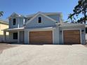 Beautiful two-story home featuring a paved driveway, and eye-catching architectural details at 3904 W Vasconia St, Tampa, FL 33629
