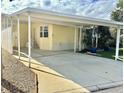 Spacious covered carport with ample parking space and convenient access to the home at 9790 66Th N St # 321, Pinellas Park, FL 33782