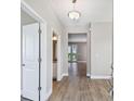 Welcoming entryway boasting a wooden-look tile floor and open doorway into the house at 2618 15Th N Ave, St Petersburg, FL 33713