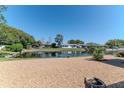 Beautiful waterfront backyard featuring gravel landscaping and scenic water view at 3729 Sail Dr, New Port Richey, FL 34652