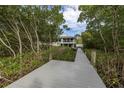 Charming waterfront home with a long dock and scenic surroundings at 734 Weedon Ne Dr, St Petersburg, FL 33702