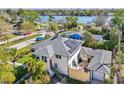 Aerial view of home with solar panels, courtyard, and waterfront community at 330 42Nd S Ave, St Petersburg, FL 33705