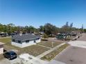 Lovely one-story house with a well-kept lawn and inviting curb appeal on a serene street at 801 37Th S Ave, St Petersburg, FL 33705