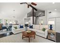 Bright living room with high ceilings, modern decor, and a unique loft ladder feature at 1205 13Th N St, St Petersburg, FL 33705