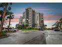 Exterior of a contemporary condominium complex featuring modern architecture and serene surroundings at 1600 Gulf Blvd # 817, Clearwater Beach, FL 33767