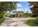 Long, luxurious circular driveway leads to this stylish home, complete with mature trees at 16211 Villarreal De Avila, Tampa, FL 33613