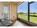 Enjoy scenic views from your private screened patio with direct backyard access at 30903 Quail Caper Cir, San Antonio, FL 33576
