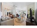 Inviting living room with wood floors, comfortable seating, and serene ambiance at 5800 Sabal Trace Dr # 301, North Port, FL 34287