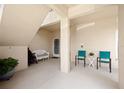 Inviting covered porch featuring seating, decor, and a welcoming entrance at 5800 Sabal Trace Dr # 301, North Port, FL 34287
