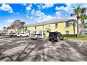 Extensive parking is available at this condo community; nearby palm trees add to the Florida charm at 113 Seahorse Se Dr # D, St Petersburg, FL 33705